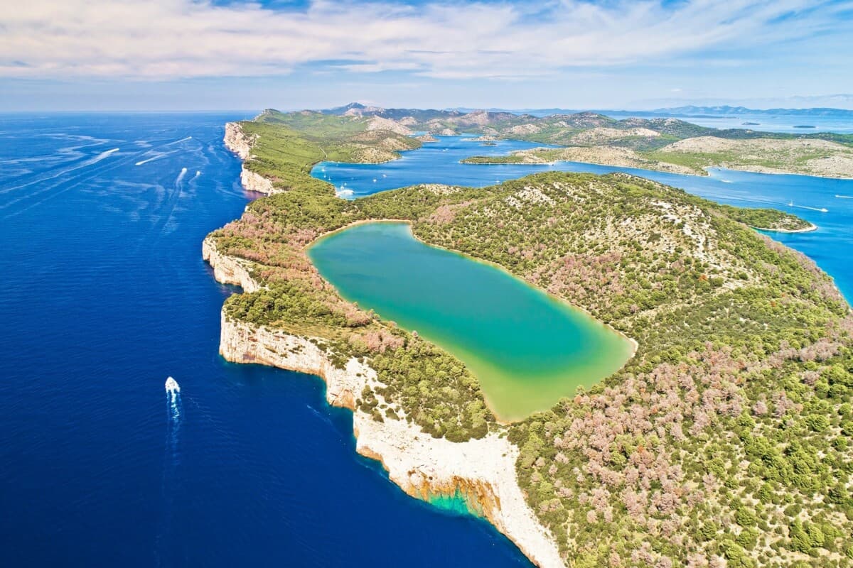 Tourists swimming in Salt Lake Mir Telašćica